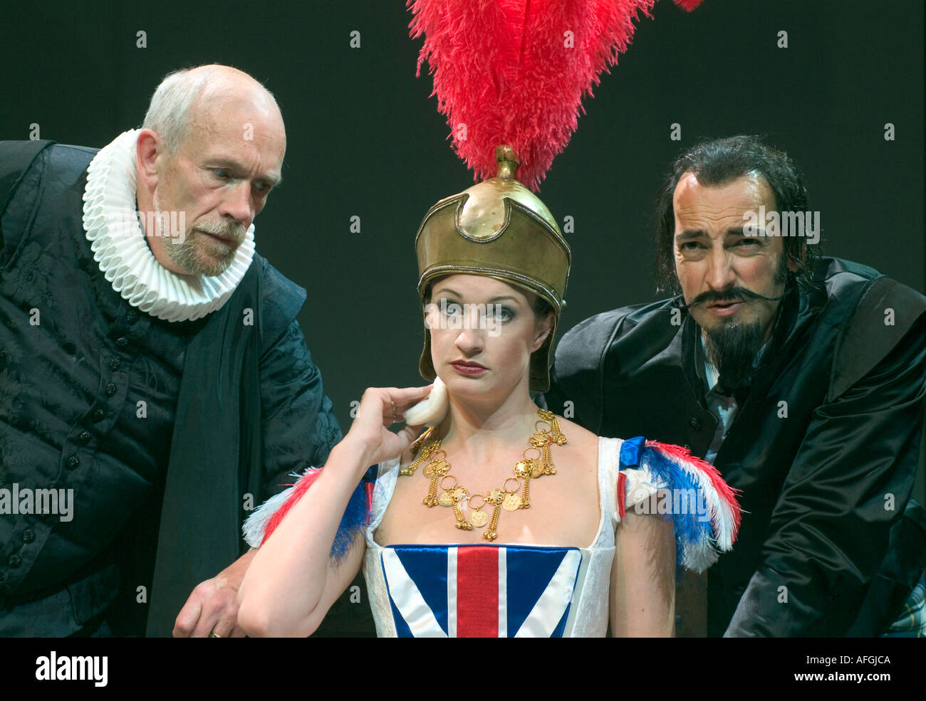 Alistair McGowan as King James, Annette McLaughlin as Queen Anne, and Hugh Ross as Robert Cecil, in 5 11, Chichester Festival Theatre, UK. Stock Photo