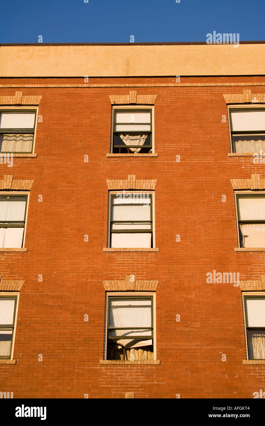 Iron bed frame in open window Stock Photo Alamy