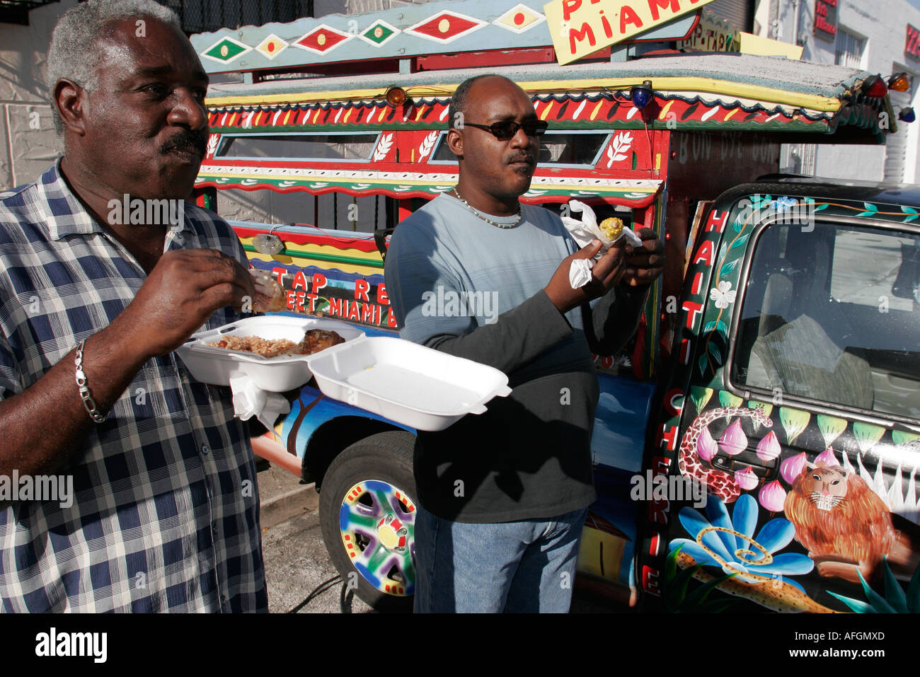 Miami Florida,Little Haiti,Caribbean Marketplace District,Discover Miami,fair,Haitian men,food,painted truck,lorry,FL060331161 Stock Photo