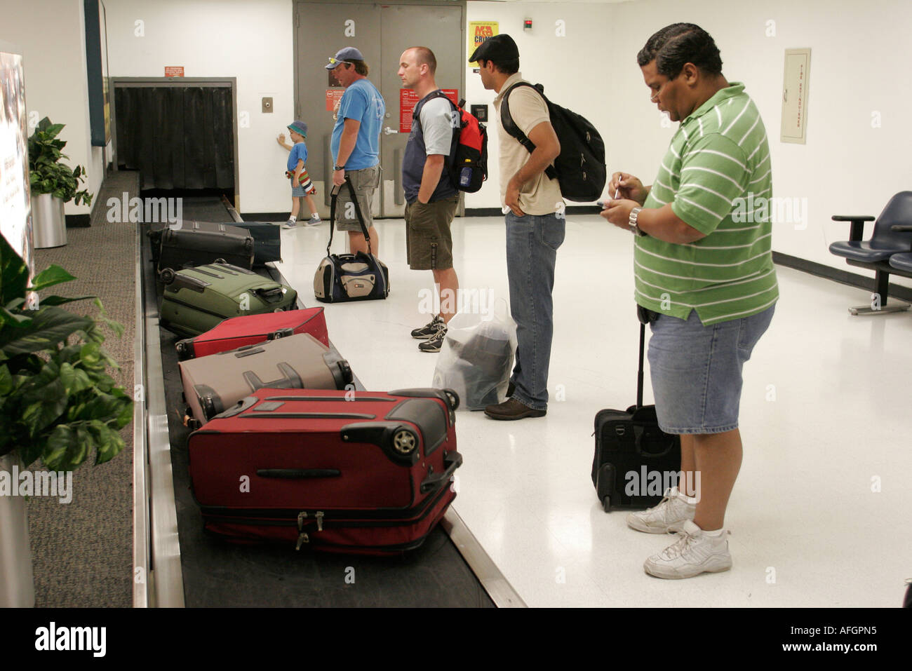 Miami Florida,Airport,passenger passengers rider riders,baggage claim