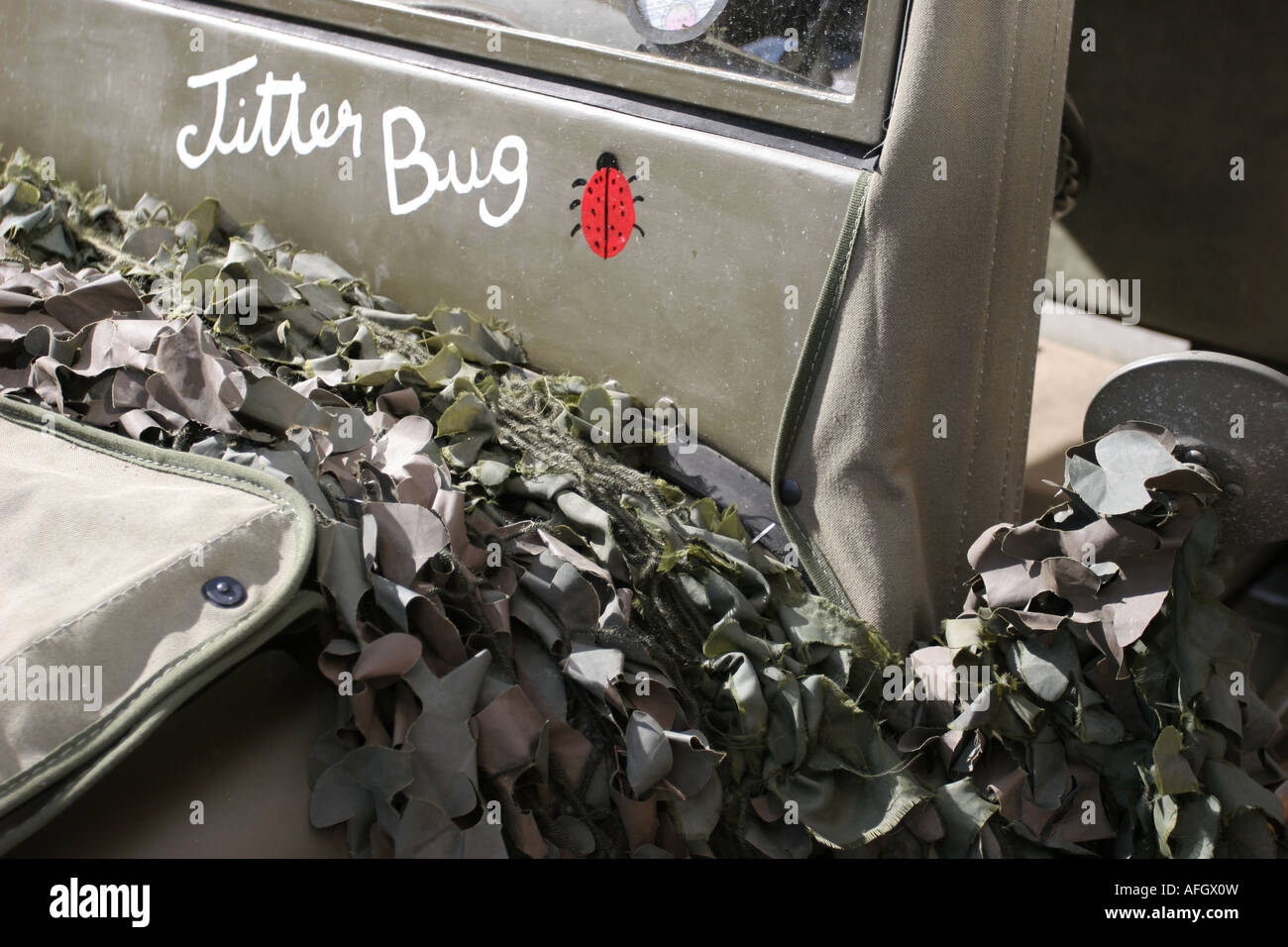 Jitter Bug and ladybird emblem on bonnet of a World War II Jeep Stock Photo