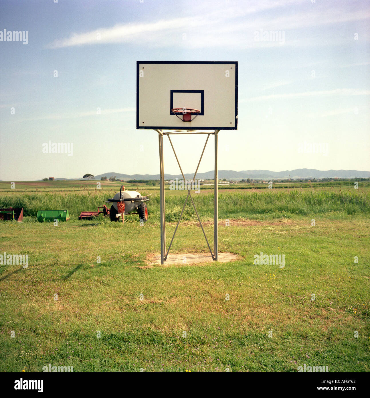 empty basketball court in a rural setting in italy Stock Photo Alamy