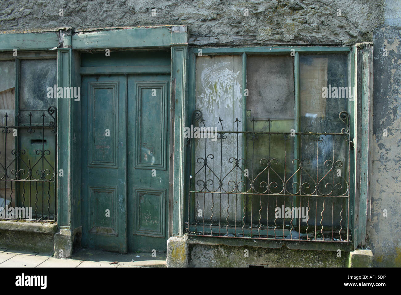 boarded up building on main street in county town Killeshandra, Co. Cavan, Ireland Stock Photo