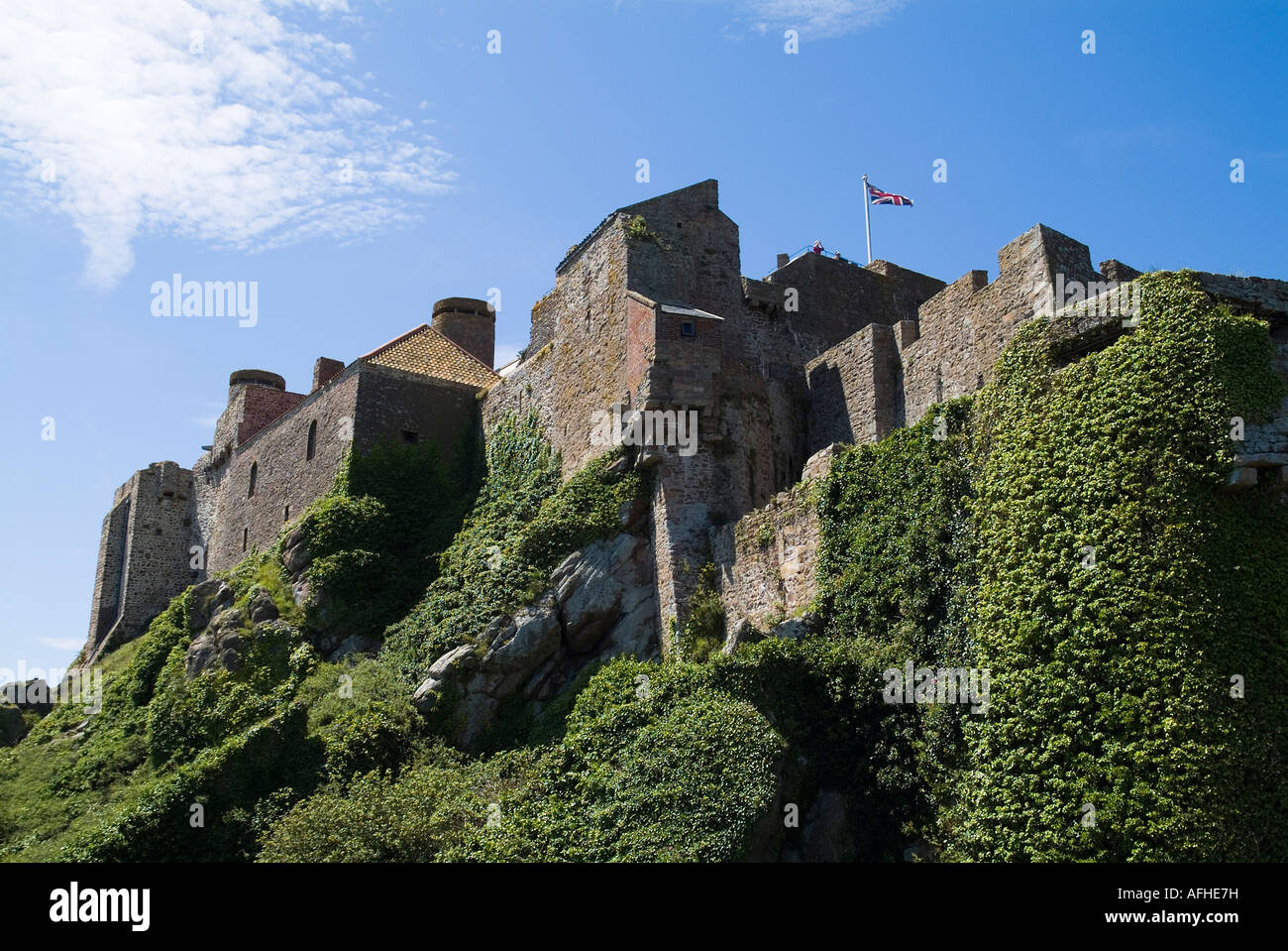 dh Mont Orgueil Castle ST MARTIN JERSEY Cliff face fortified castle  battlements and buildings Stock Photo - Alamy