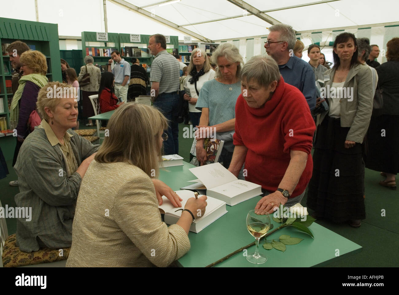 Book signing PR watching over event. Hay-on-Wye the book and literary festival. UK 2006 2000s HOMER SYKES Stock Photo