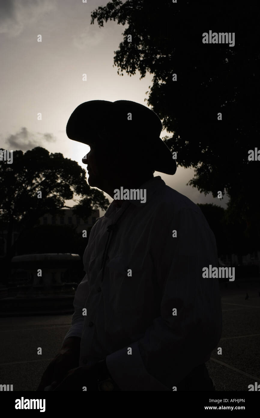 Man wearing hat silhouette hi-res stock photography and images - Alamy