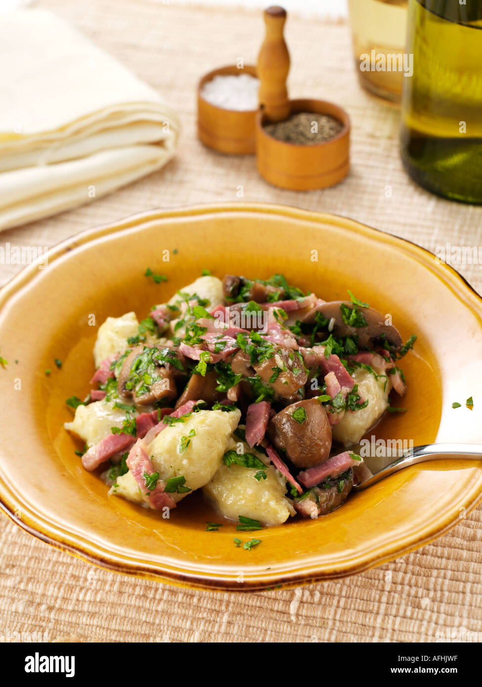 Italian gnocchi bacon lardons mushrooms hires stock photography and