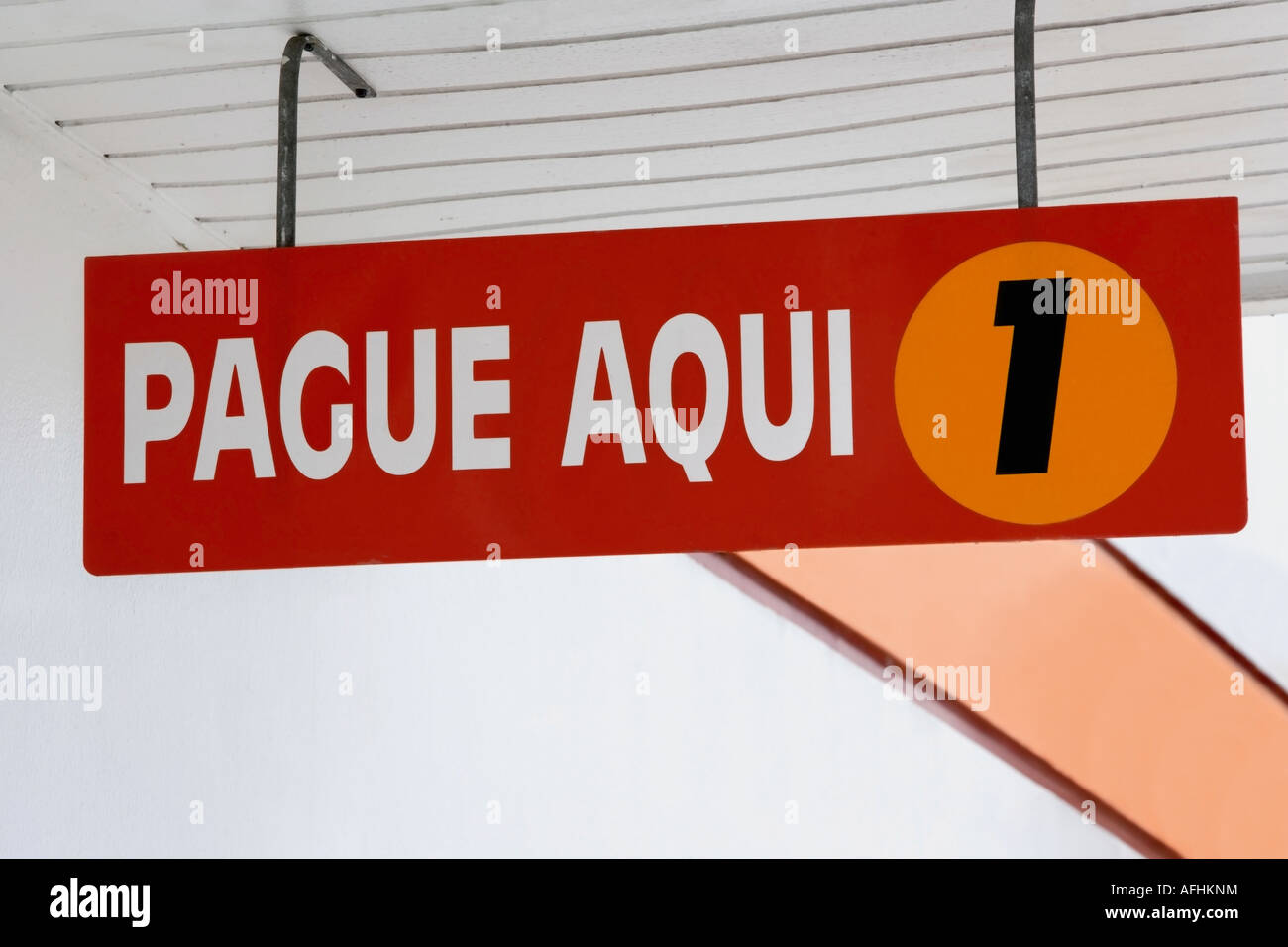 Pay here sign, Spanish Stock Photo Alamy