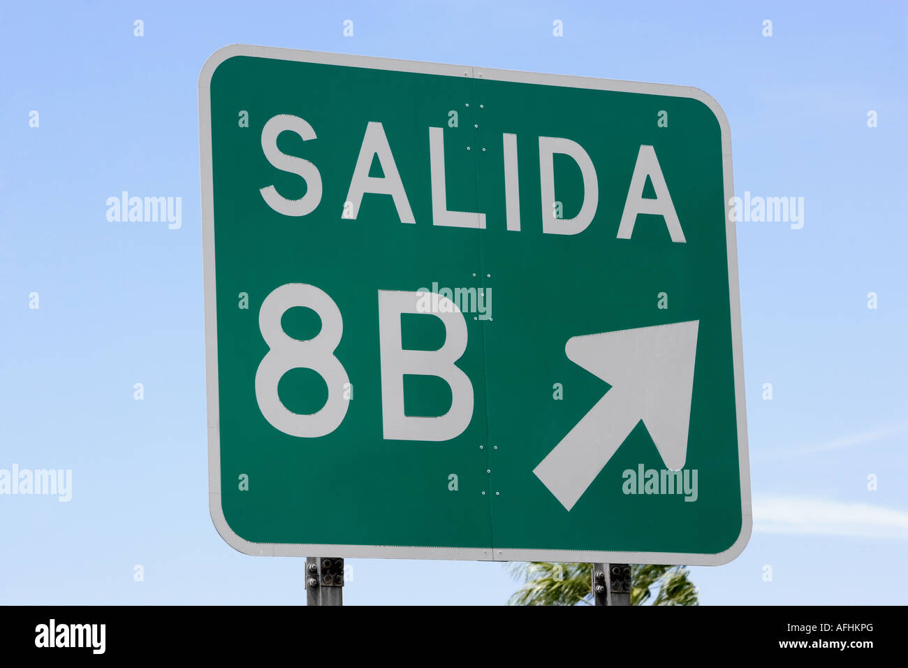Freeway exit sign, Spanish Stock Photo Alamy