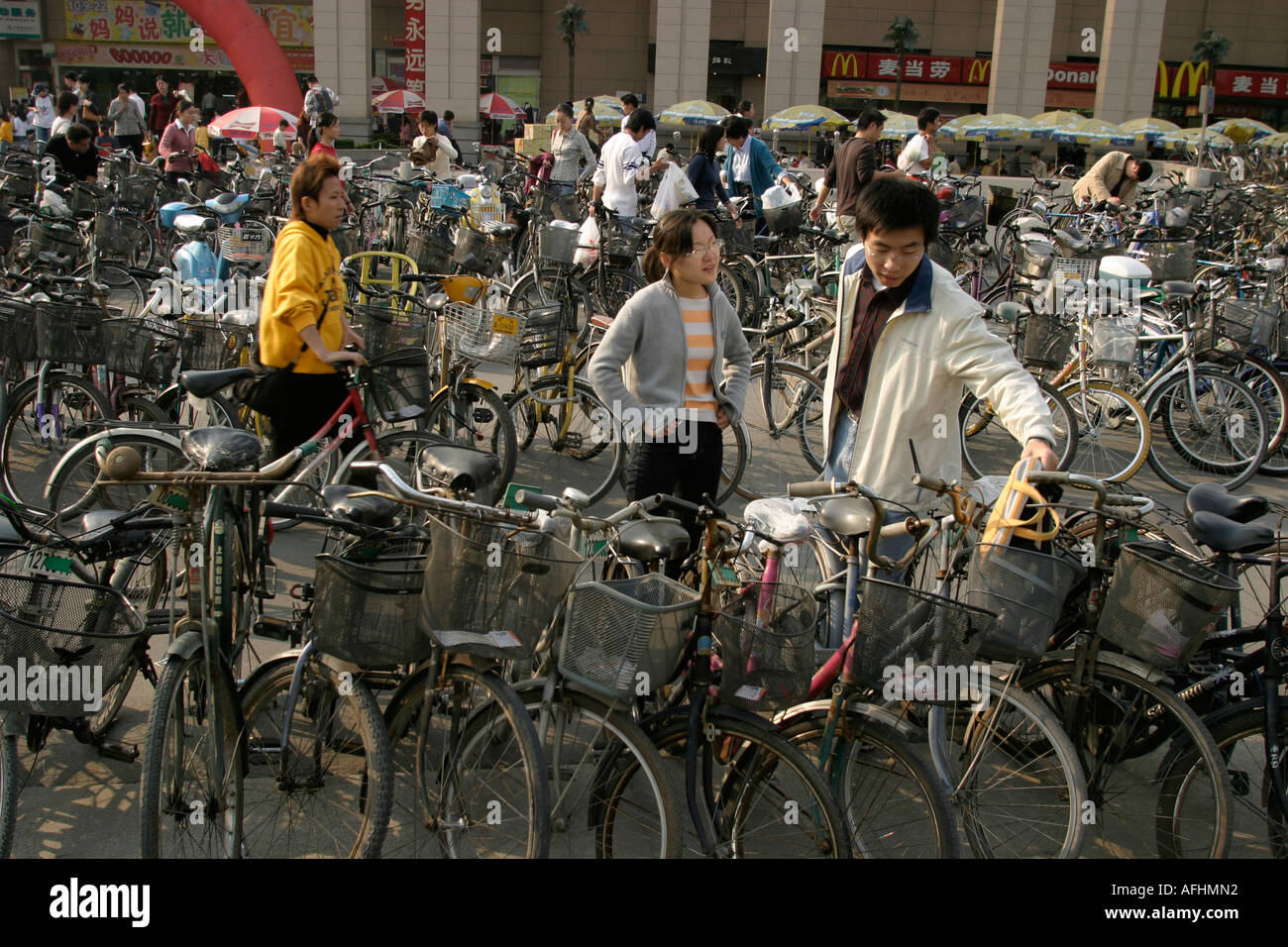 Students park their bikes Stock Photo