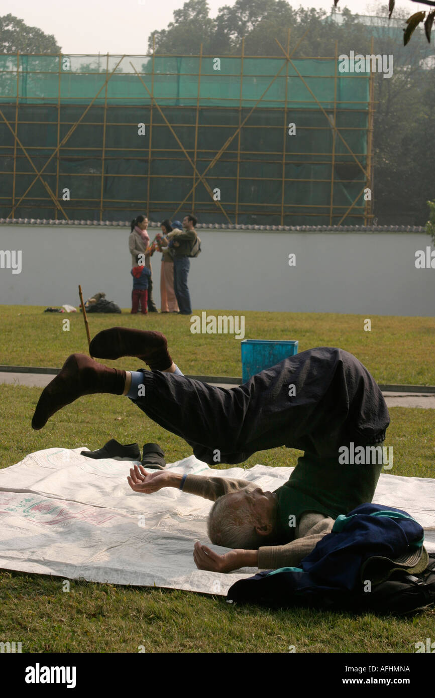 An old man doing exercises Stock Photo