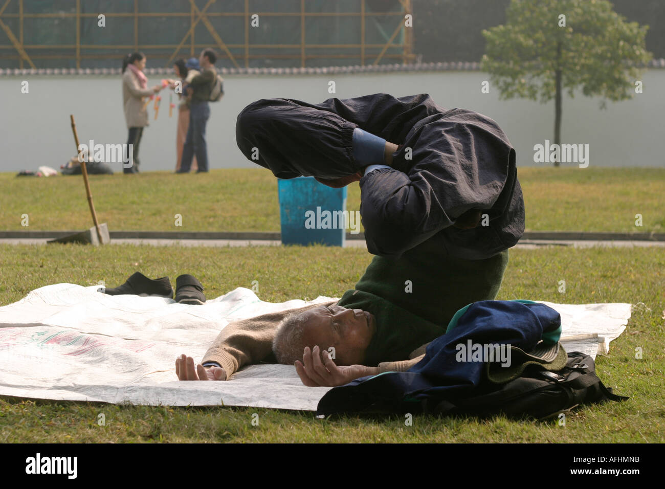 An old man doing exercises Stock Photo