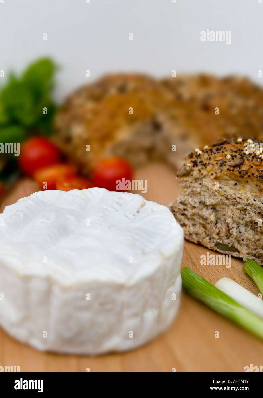 Goats cheese and seeded bread Stock Photo Alamy