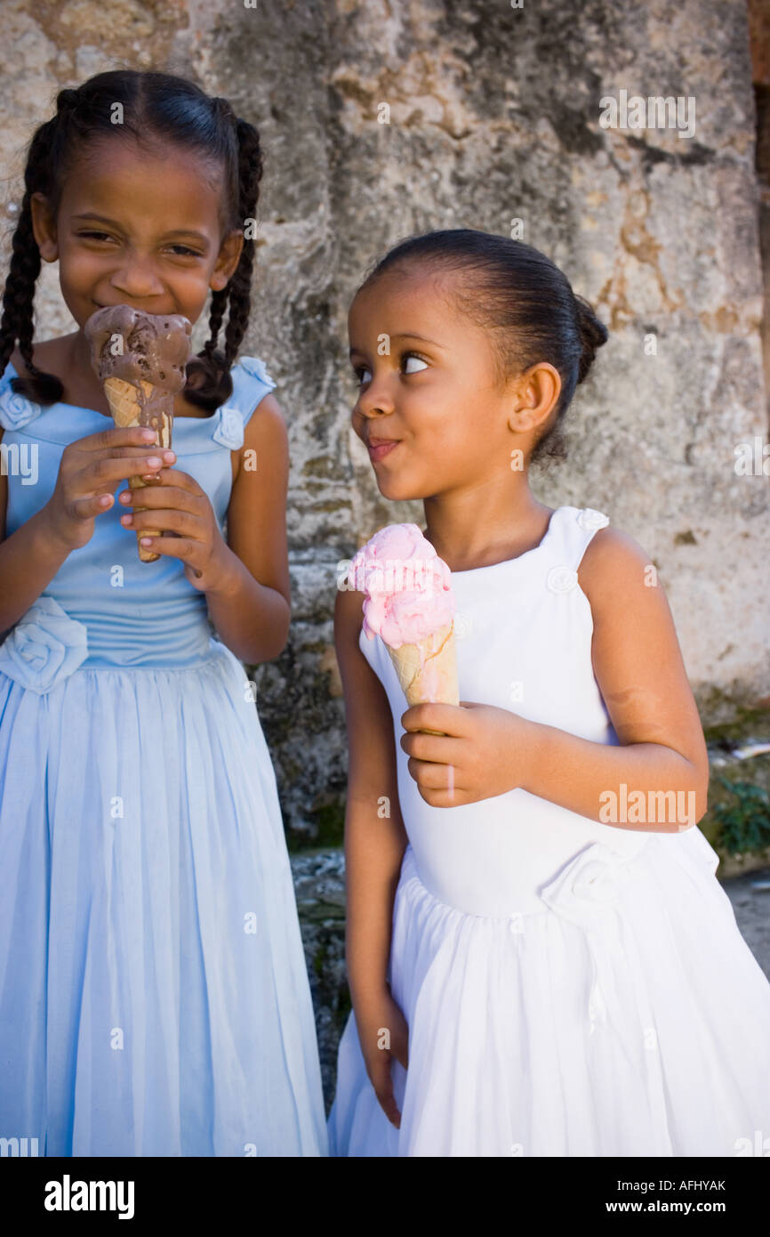 Close-up of two girls eating ice-creams Stock Photo