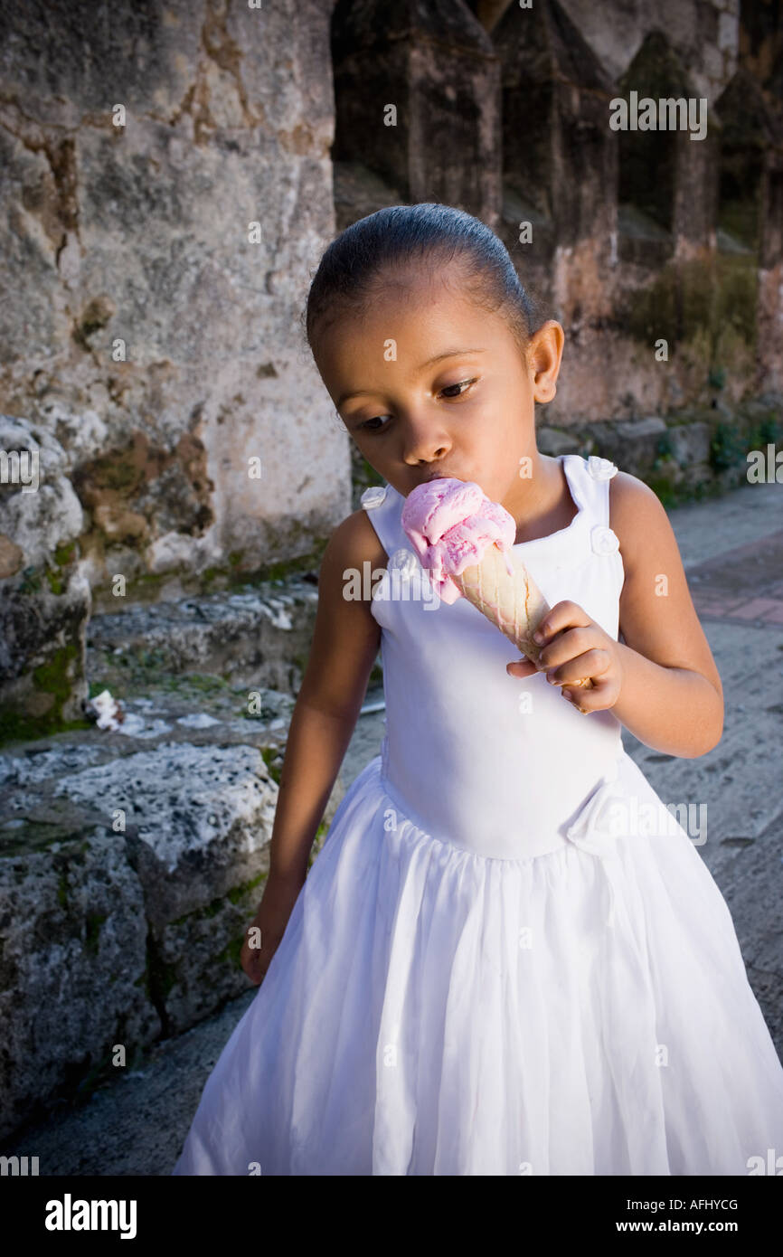 Close-up of a girl eating an ice-cream Stock Photo