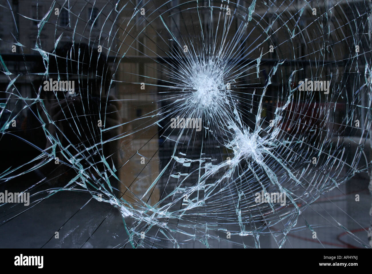 Cracked glass from rioting on O'Connell st, Dublin Stock Photo
