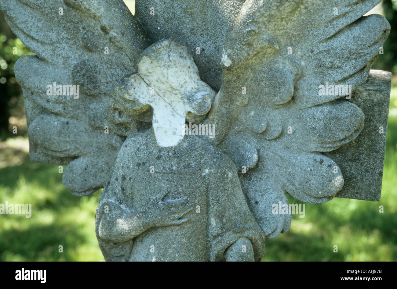 Gravestone angel with a missing face in a graveyard Stock Photo Alamy