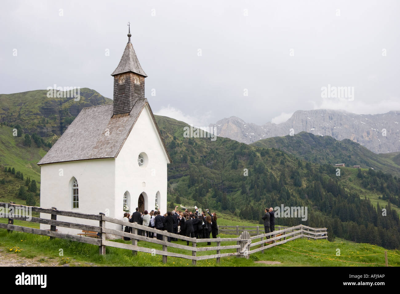 Wedding in a small white chapel next to Berghaus Zallinger on Alpe di Siusi  in South Tyrol Stock Photo - Alamy