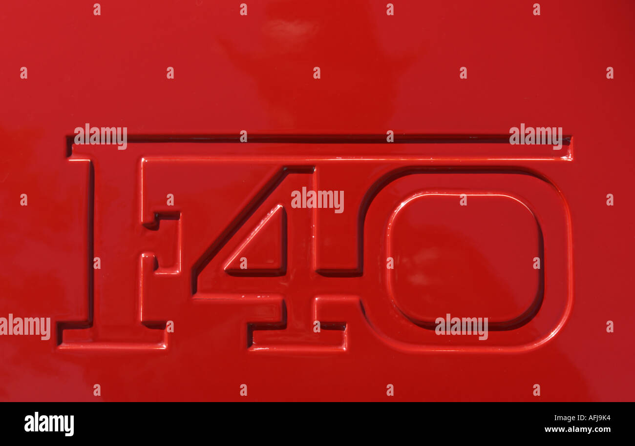 The moulded logotype in the rear wing support of a Ferrari F40 sports car. Stock Photo