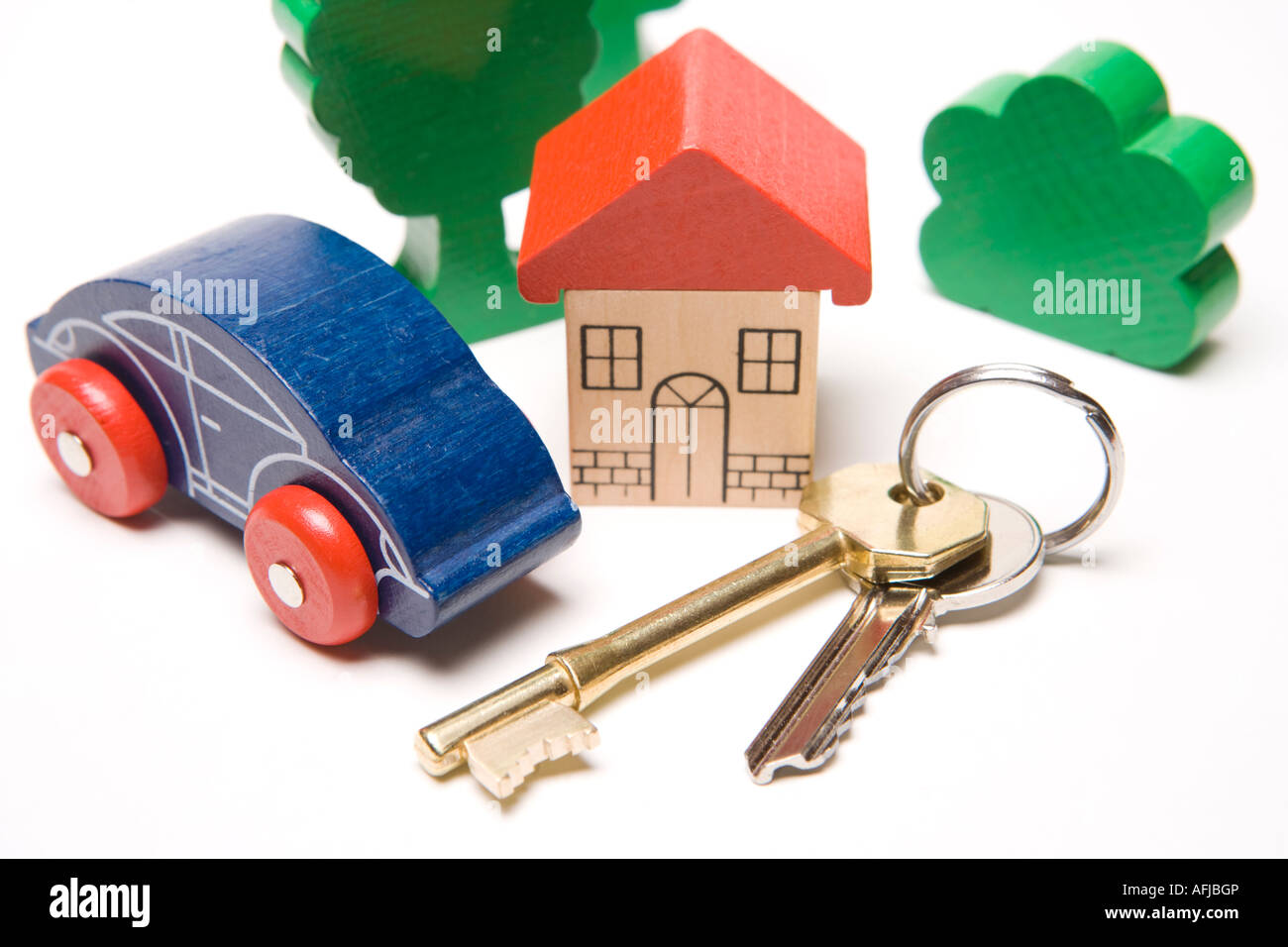 Housing key to house or property in the suburbs or the country with car outside Stock Photo