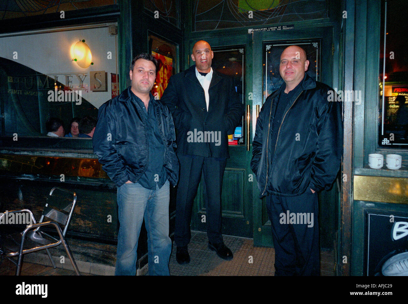 Bouncers on the door at entrances Stock Photo Alamy