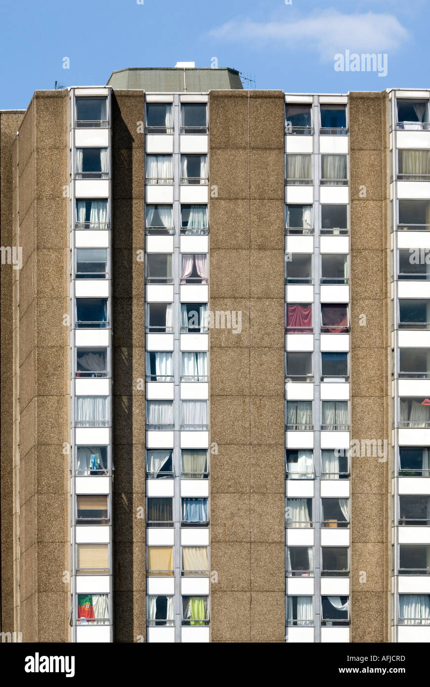 Top section of high rise block of flats showing an assortment of curtain styles Stock Photo Alamy