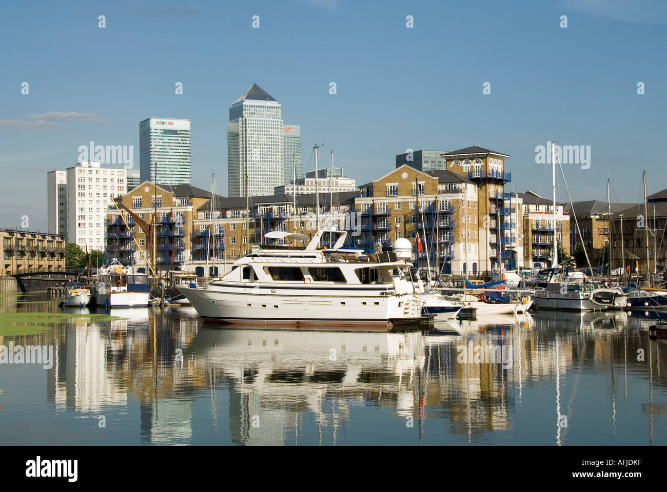Limehouse basin with modern residential apartment blocks boats at