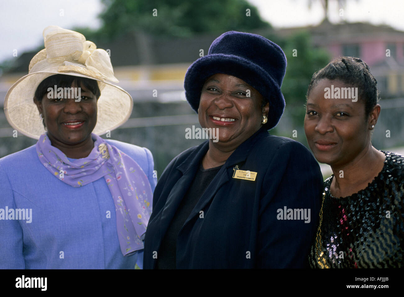 Ladies wearing Sunday best outfits and hat at church service, Nassau, Bahamas Stock Photo