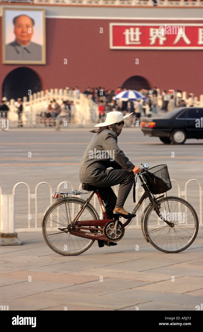 Cyclist in Tianenman Square Beijing China Stock Photo
