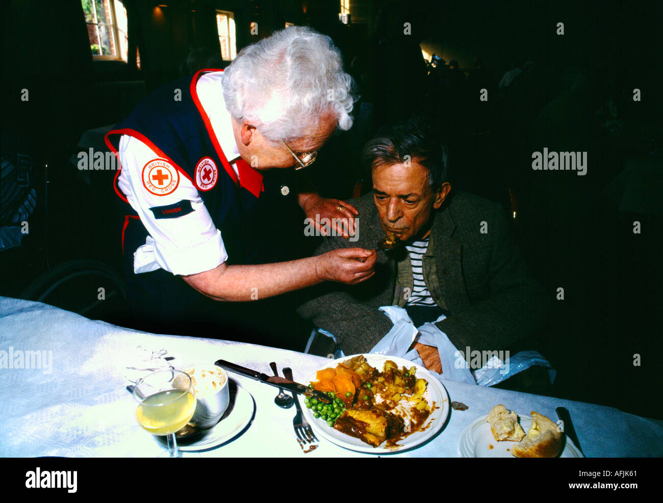 Lest We Forget Association Volunteer Worker Feeding Old Soldier St Andrews Church Stock Photo