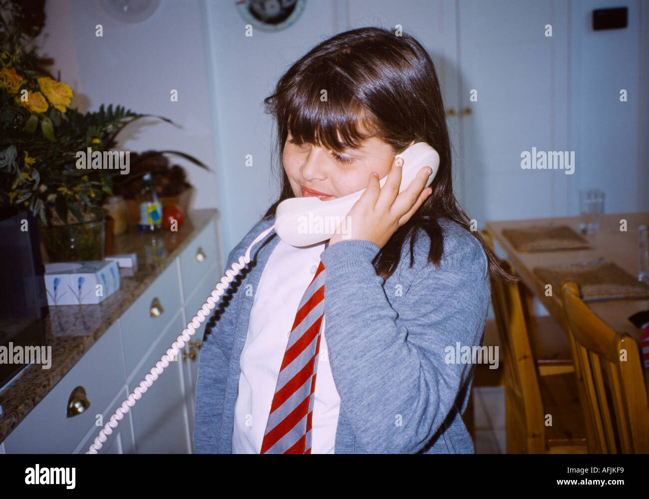 Girl On Telephone Aged 9 Stock Photo