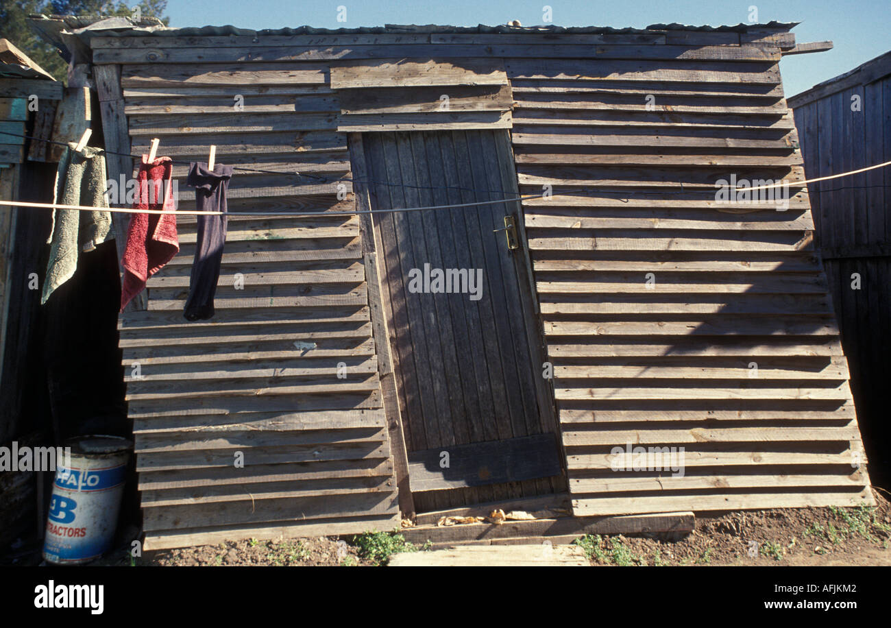 A leaning wooden house in Duncan Village township, South Africa Stock Photo Alamy