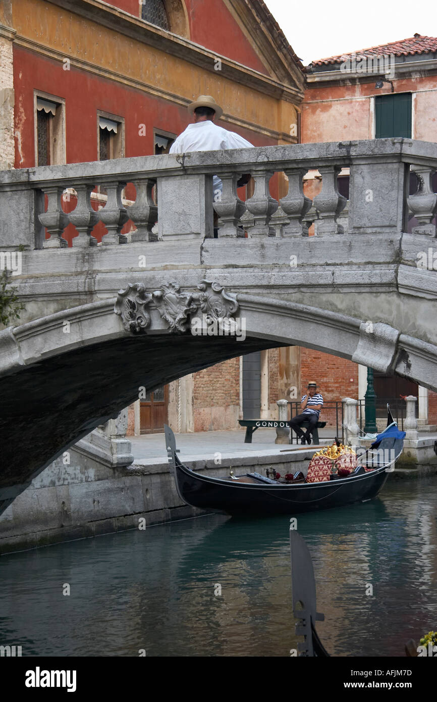 Rio Del Palazzo and gondolier on bench Venice Italy Stock Photo