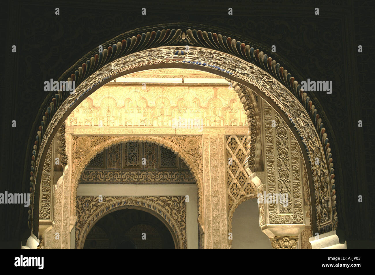 Ornate plaster archway in Alcazar former moorish fortress in Seville ...