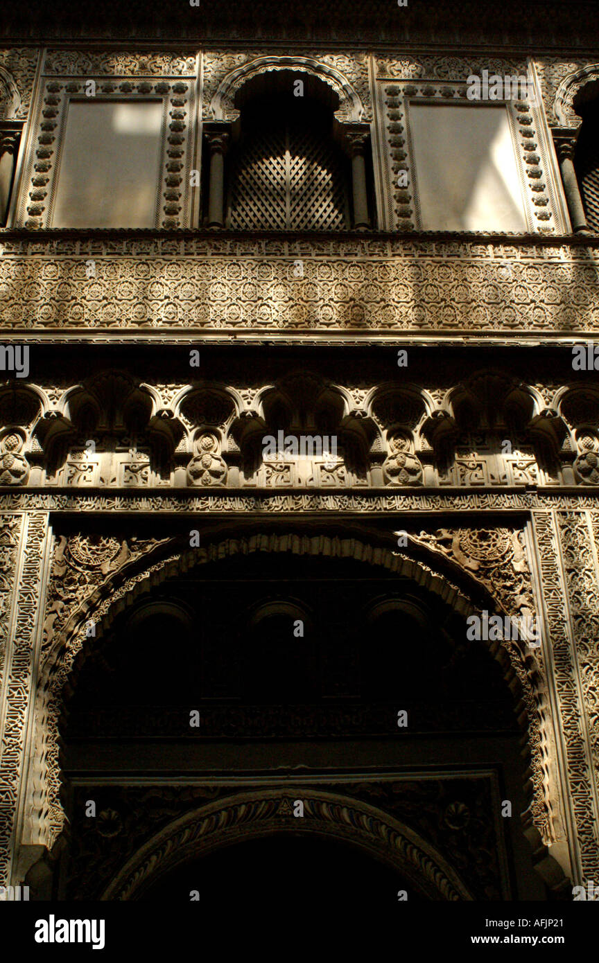 Ornate plaster archway in Alcazar former moorish fortress in Seville ...