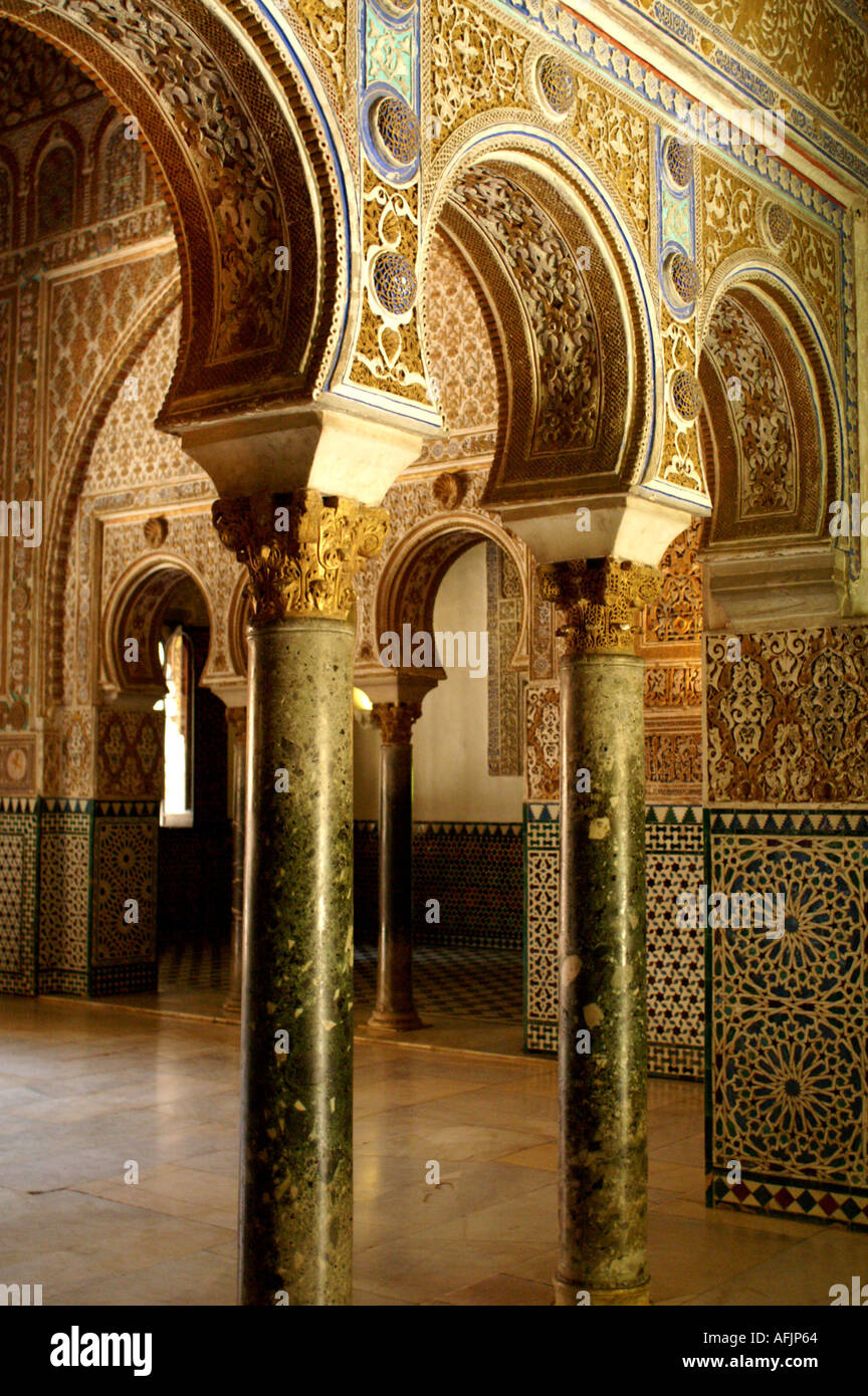 Ornate plaster archway in Alcazar former moorish fortress in Seville ...