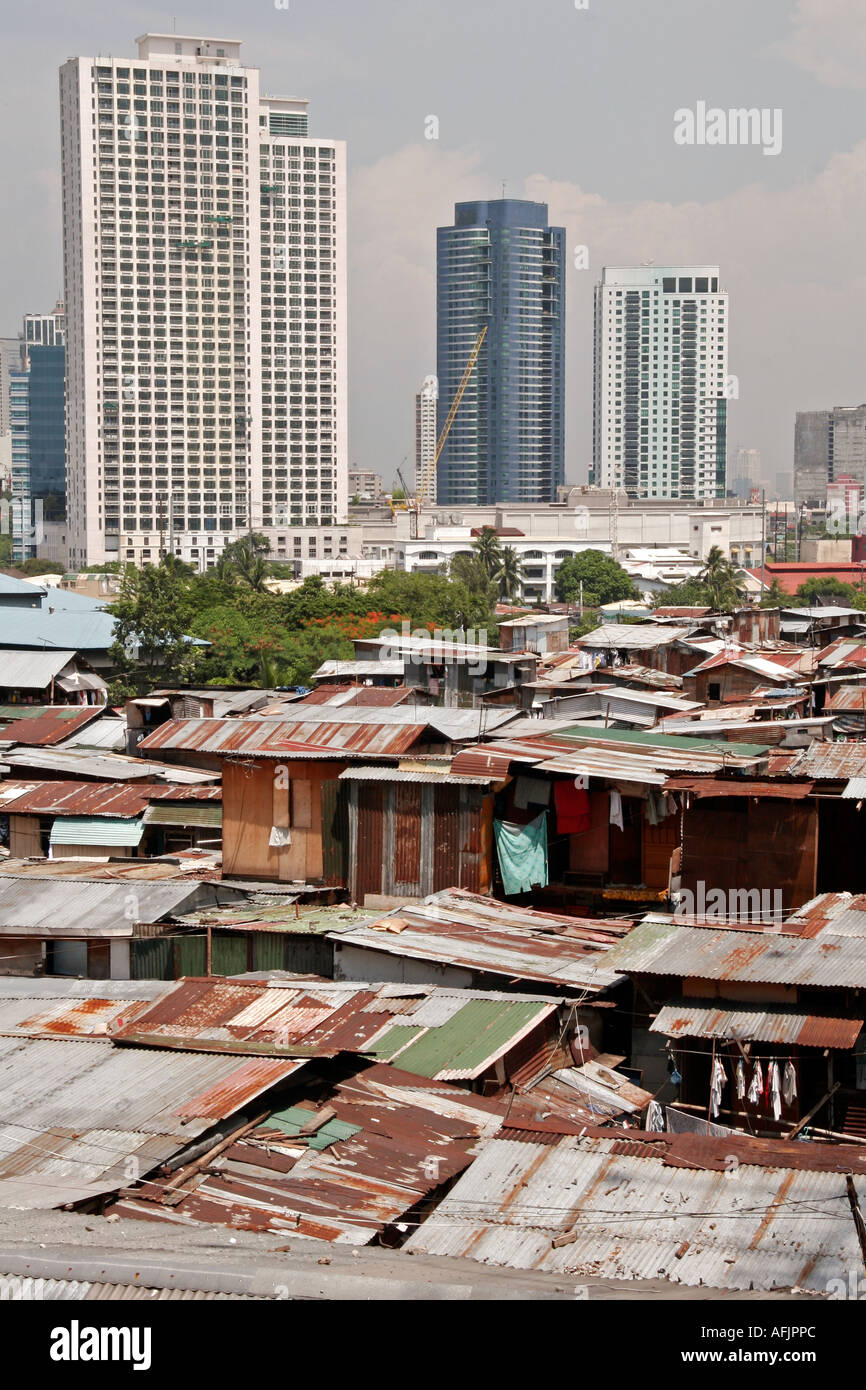 Squatter settlement and skyscrapers Guadeluppe Manila Philippines Stock Photo