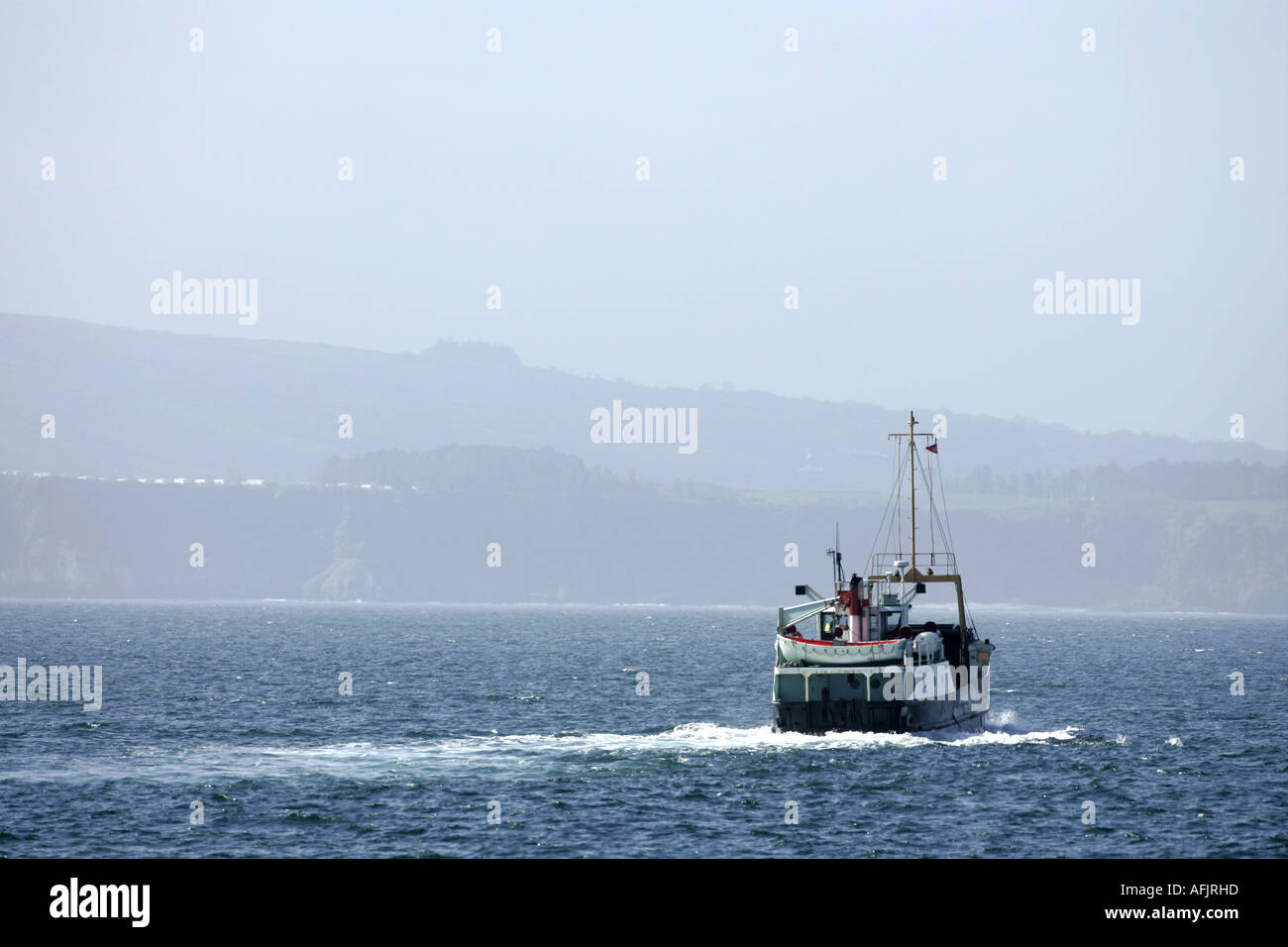 Caledonian MacBrayne MV Raasay  ferry sails off to Ballycastle from Rathlin Island northern ireland Stock Photo