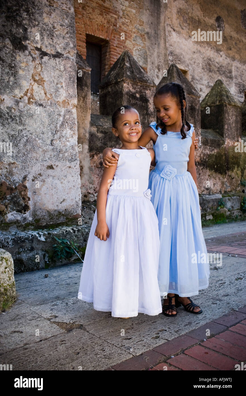 Two children arms around each other hi-res stock photography and images ...