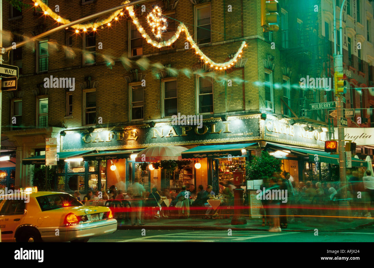 New York City,Manhattan,urban,metropolis,Little Italy Mulberry Street Caffe Napoli,restaurant restaurants food dining cafe cafes,al fresco sidewalk ou Stock Photo