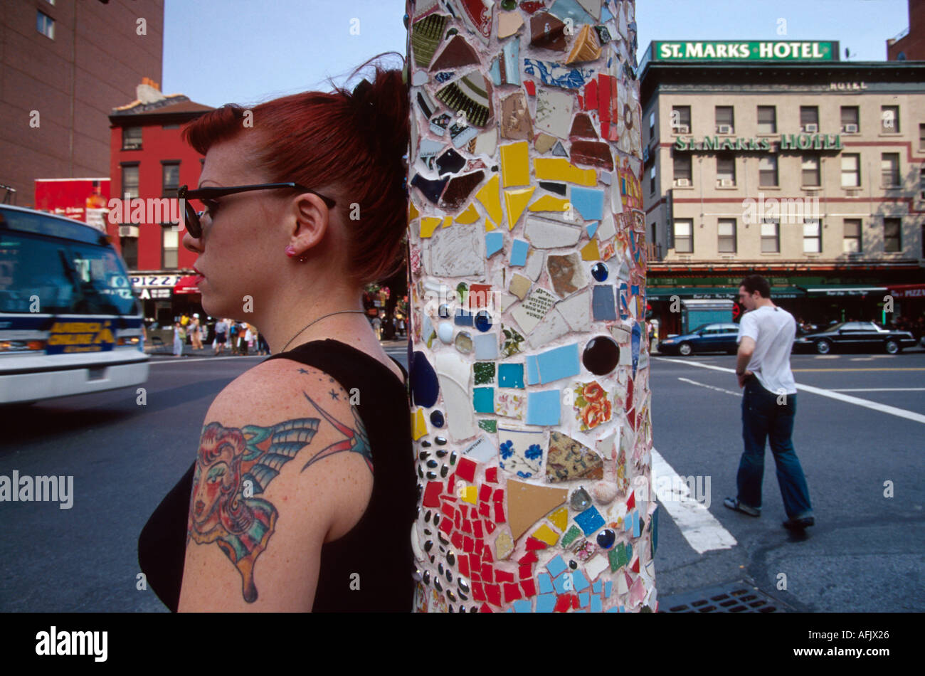 New York City,Manhattan,urban,metropolis,East Village 3rd Avenue St. Marks Place mosaic lamppost,lamp post,design,advertise,market,currency,money,noti Stock Photo