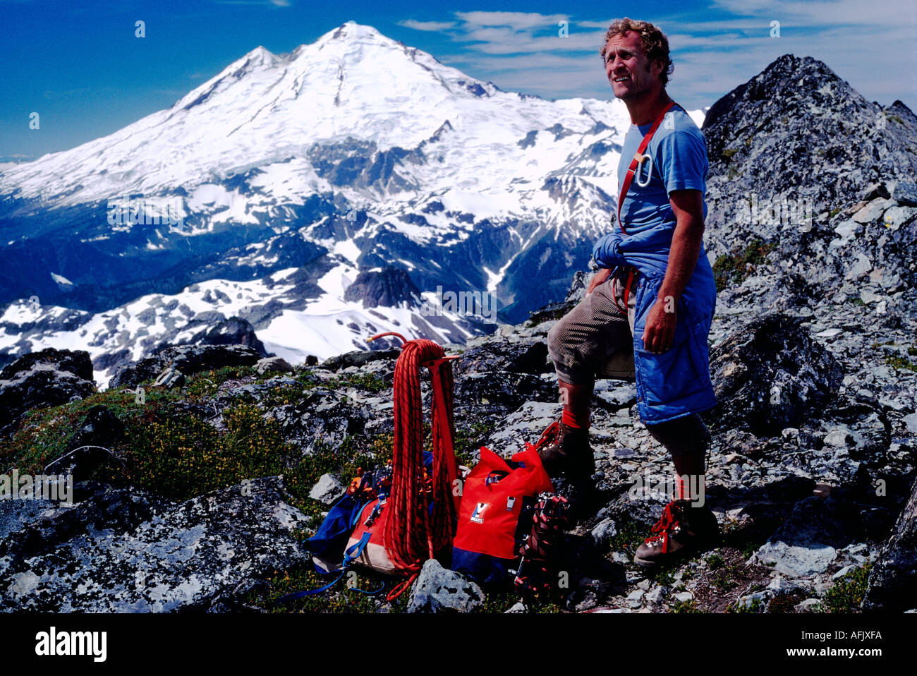 A Rock Climber prepared to climb in the Coast Mountains along the