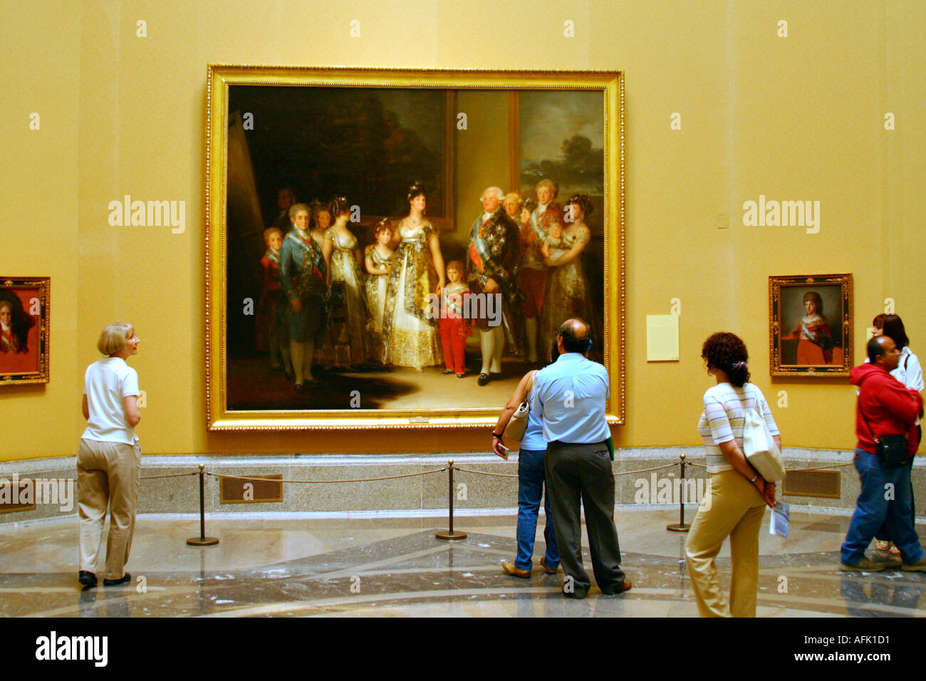Museo del Prado Museum Art Gallery Tourists admire Charles IV and family by Goya Madrid Spain Europe Stock Photo