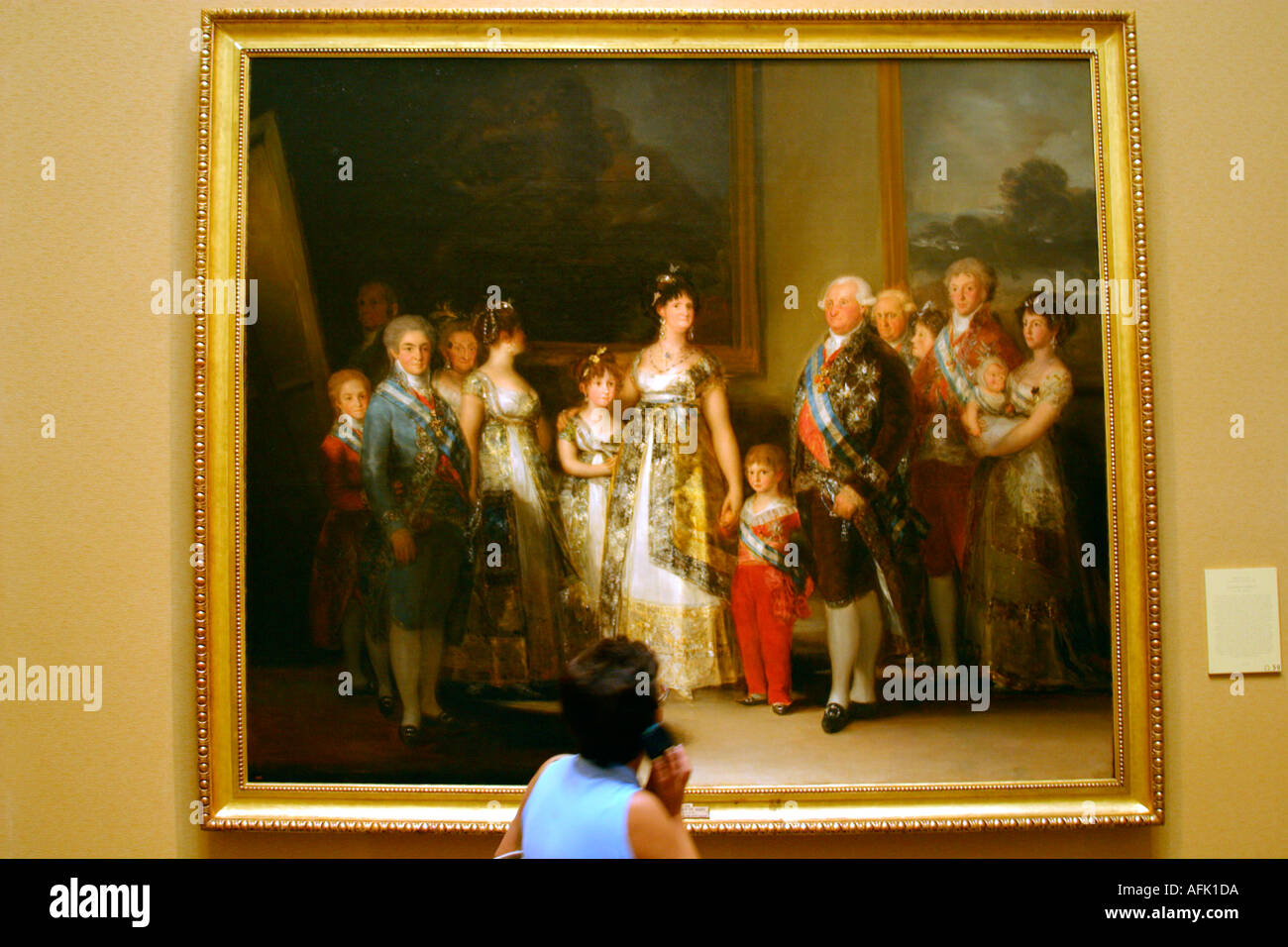 Madrid Museo del Prado Museum and Art Gallery tourist admires Charles IV and family by Goya Madrid Spain Espana Europe Stock Photo