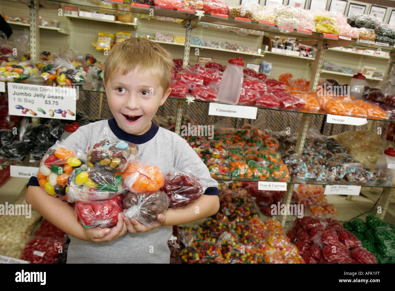 Boy boys male kids children holds bags hires stock photography and