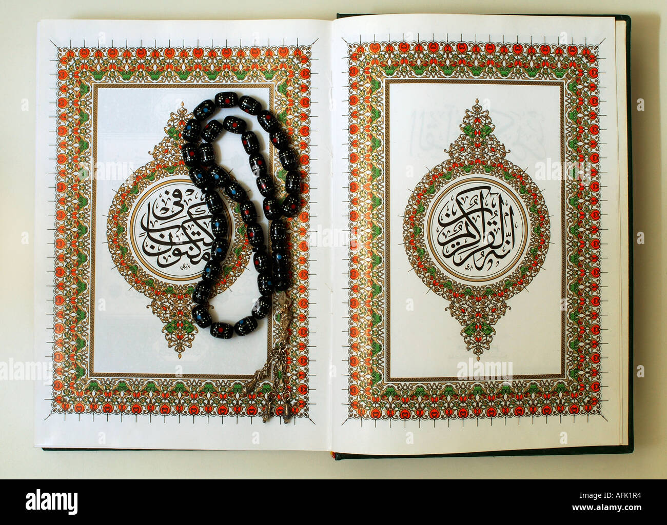 A copy of the sacred text of islam qur an opened for reading with