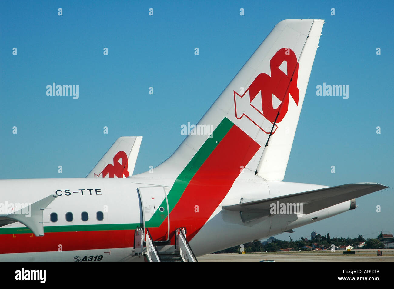 Tail planes of Airbus A319-111 TAP flag carrier airline of Portugal at Lisbon airport Portugal Stock Photo