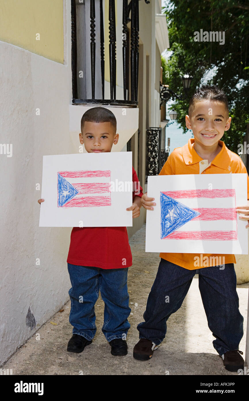 Boys holding drawing of the Puerto Rican flag Stock Photo - Alamy