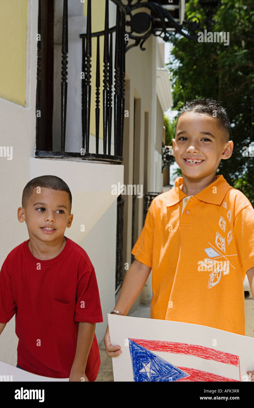 Boys holding drawing of the Puerto Rican flag Stock Photo - Alamy