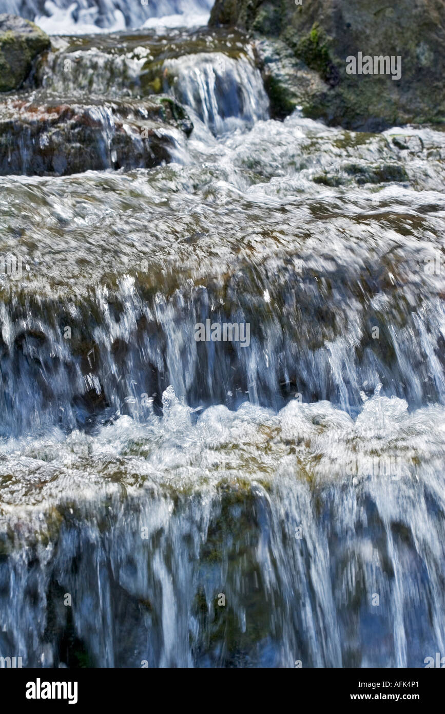 Water cascading down the rocks Tel Dan Israel Stock Photo